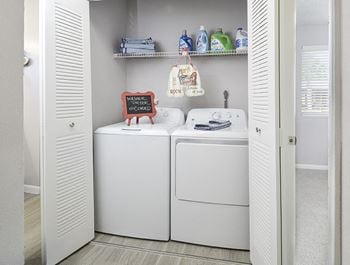 Washer and dryer setup in select units